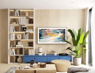 a room with a blue cabinet and a plant